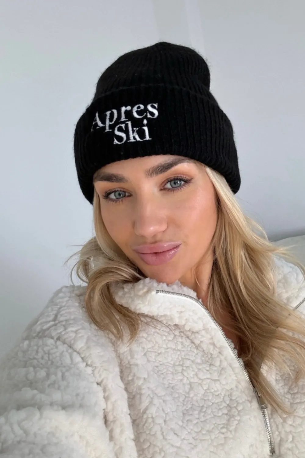 Apres ski black embroidered knit beanie hat